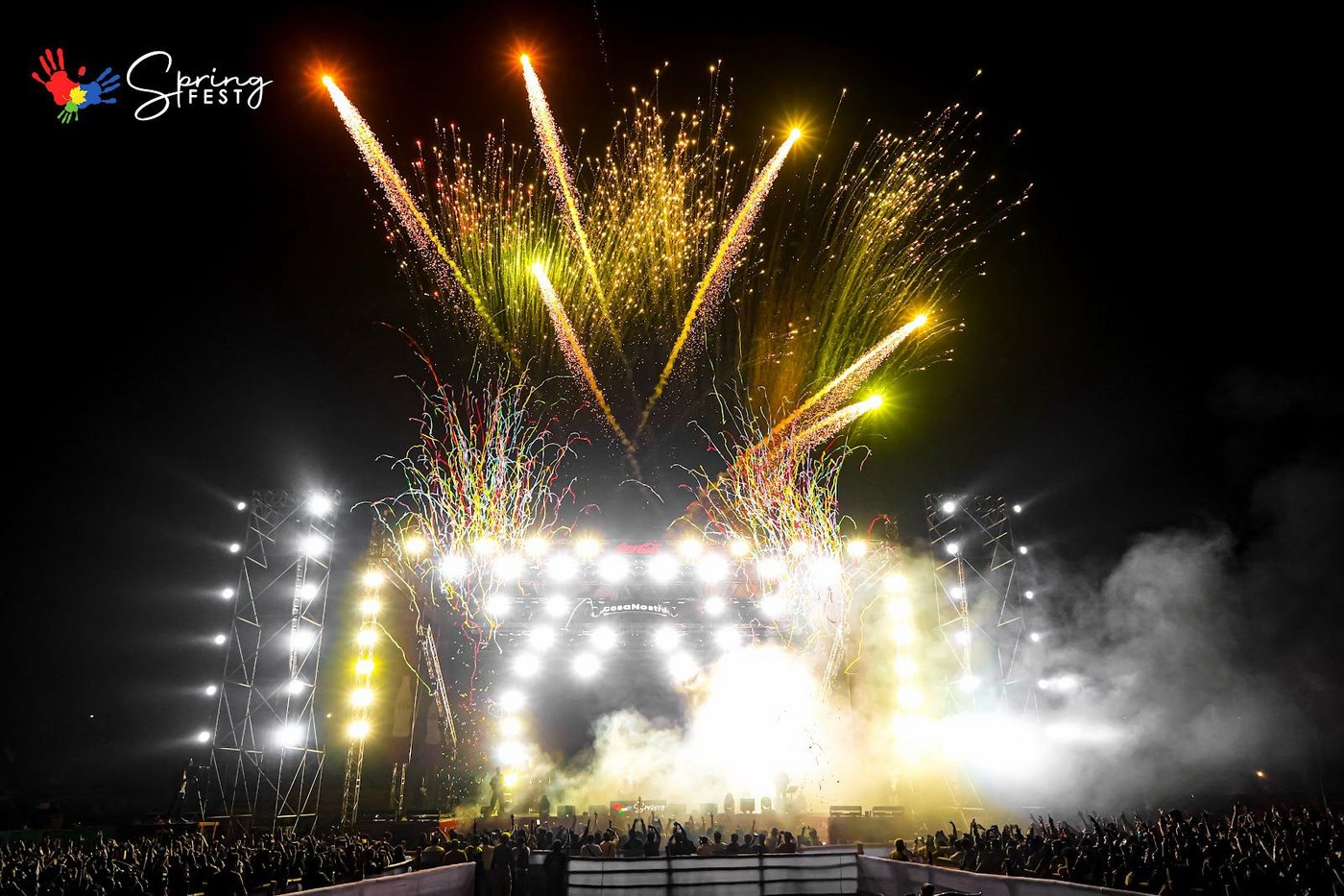 Fireworks over the main stage with the crowd in front of it